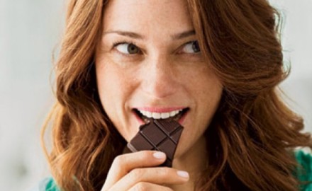 happy-woman-eating-chocolate-0710-410x290