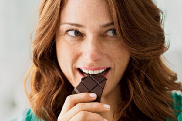 happy-woman-eating-chocolate-0710-410x290