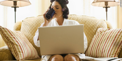 120722041610-woman-laptop-curlers-coffee-story-top