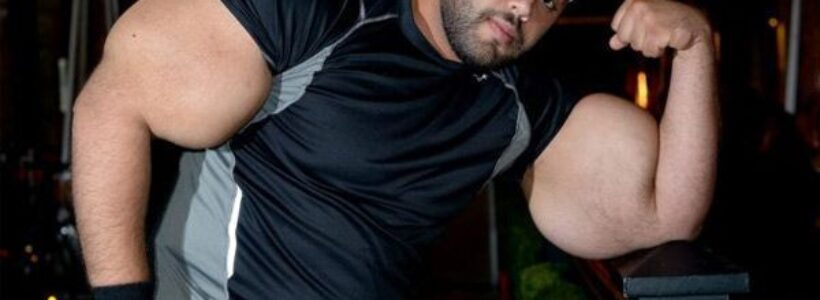660_hombre_con_los_biceps_mas_grandes_del_mundo