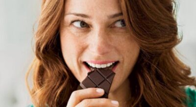 happy-woman-eating-chocolate-0710-410x290